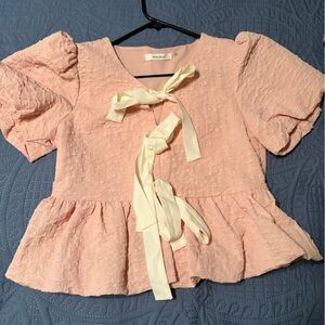 Elegant Pink Blouse with Cream Bow